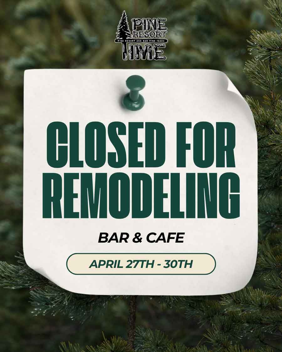 Notice pinned to pine branches reads: Pine Resort bar & cafe closed for remodeling, April 27th-30th.